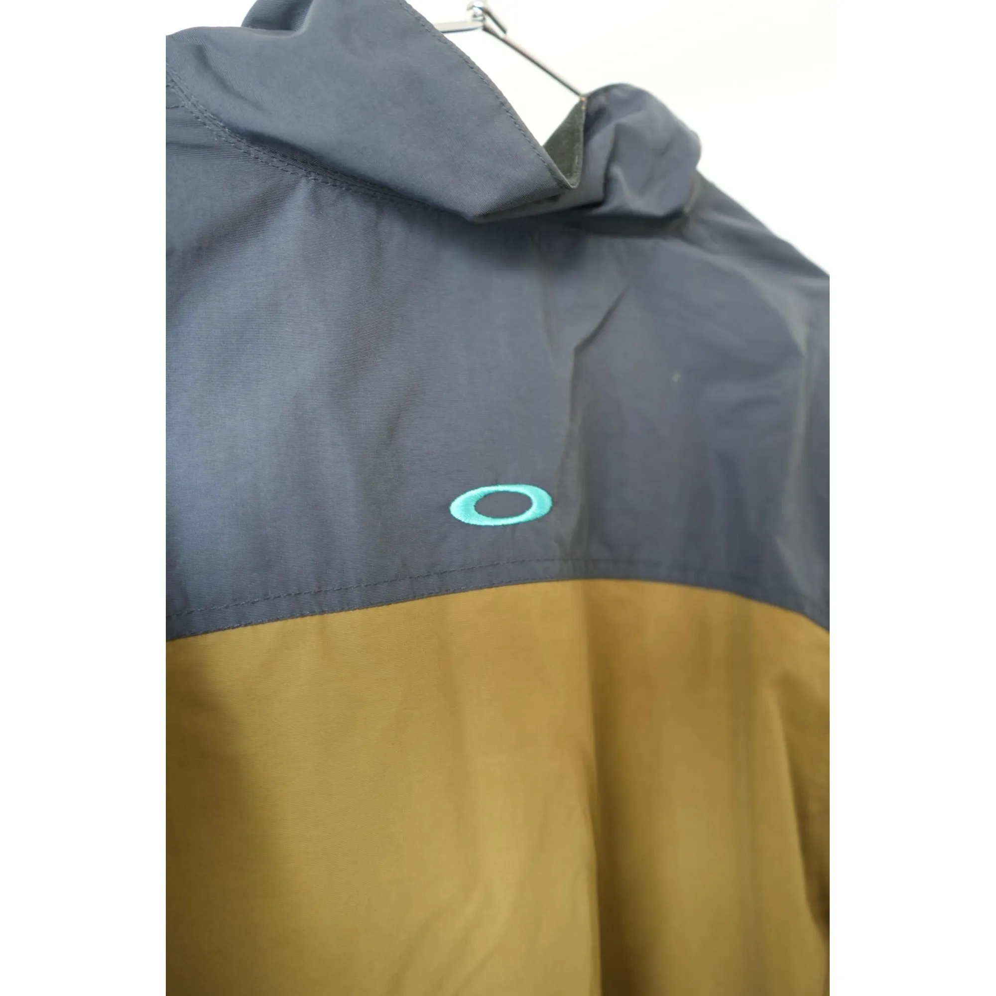 "Retail" Oakley 100% Nylon Full Zip Windbreaker Jacket Navy Blue/Brown Large Men's