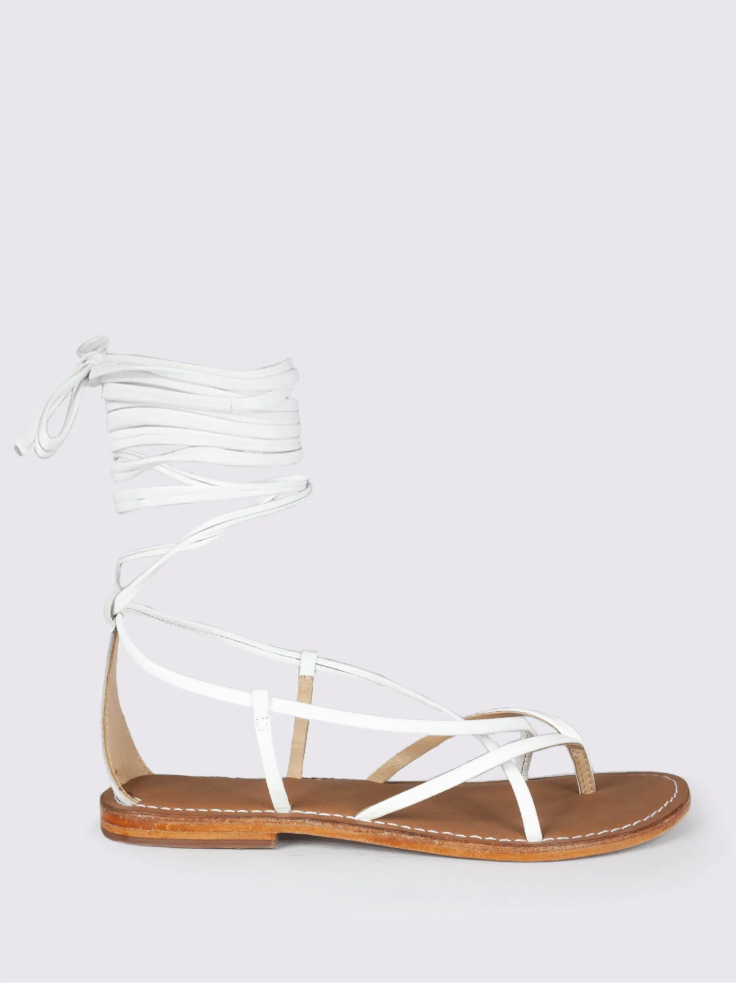 Sandalo in pelle bianca con lacci modello schiava
