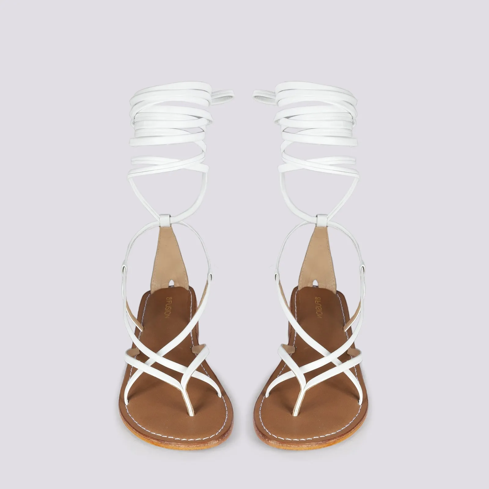 Sandalo in pelle bianca con lacci modello schiava